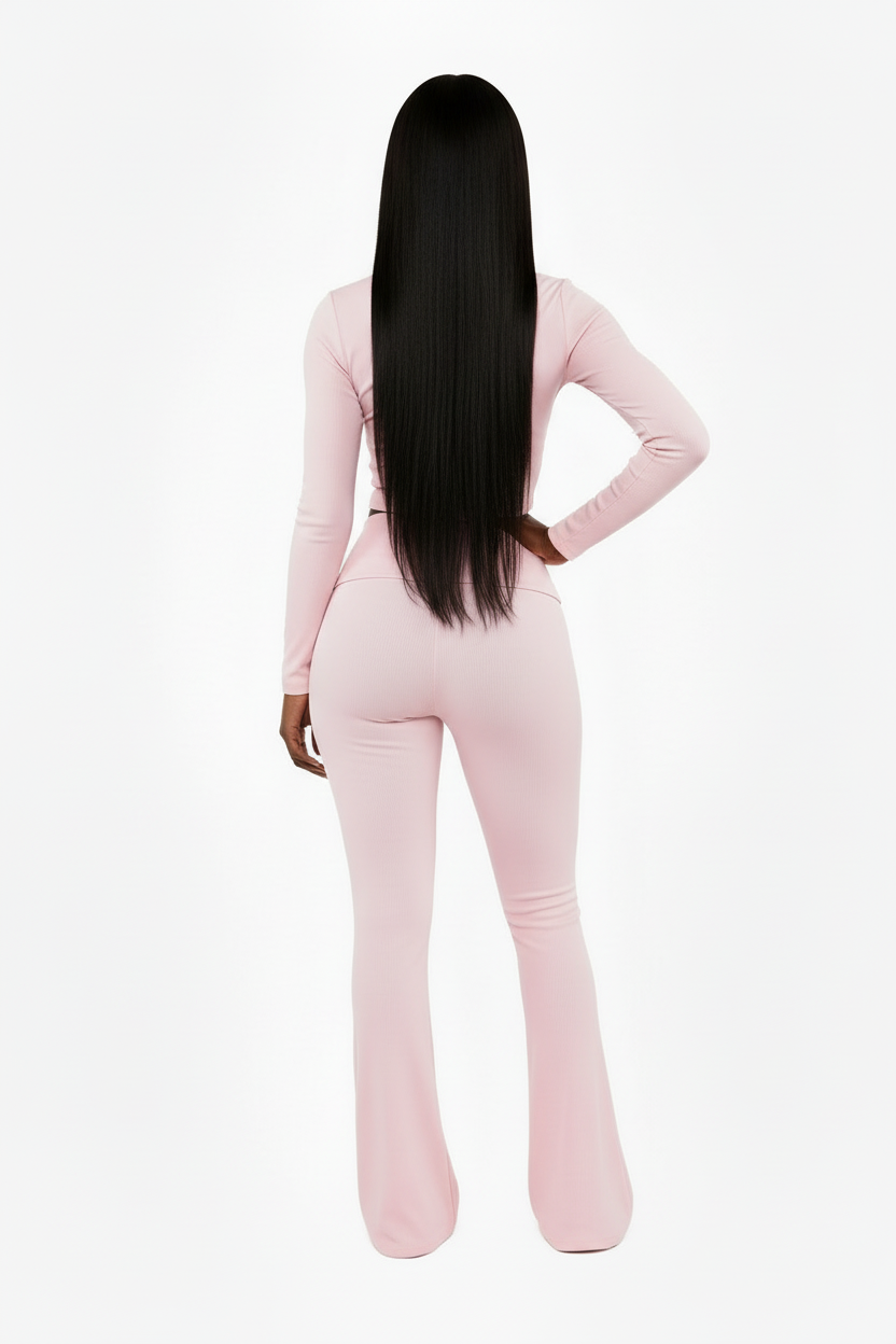 Baby pink ribbed outfit back view with confident pose