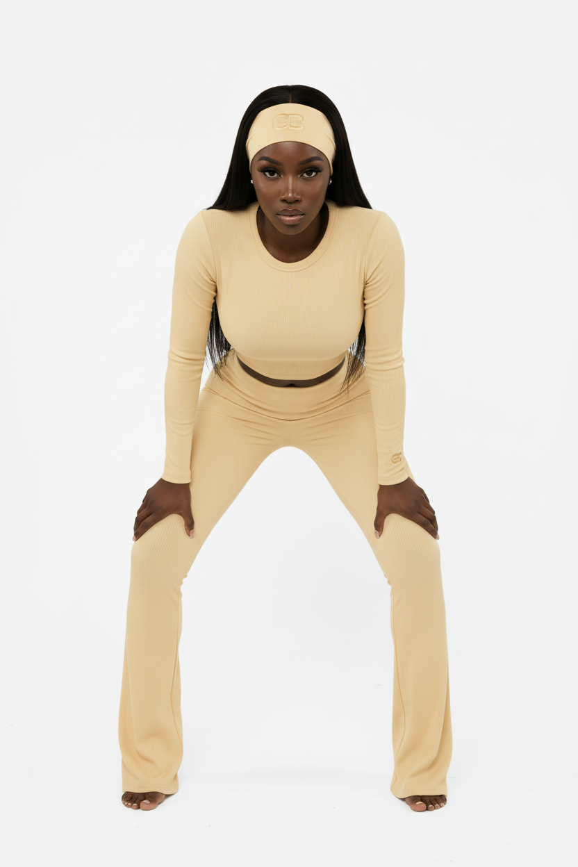 Buttery yellow outfit bold editorial pose