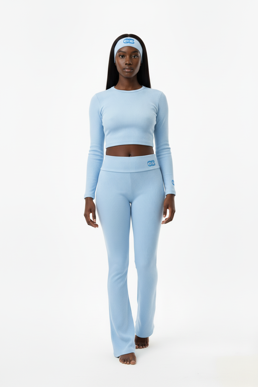 Pastel baby blue ribbed set with powerful confident stance